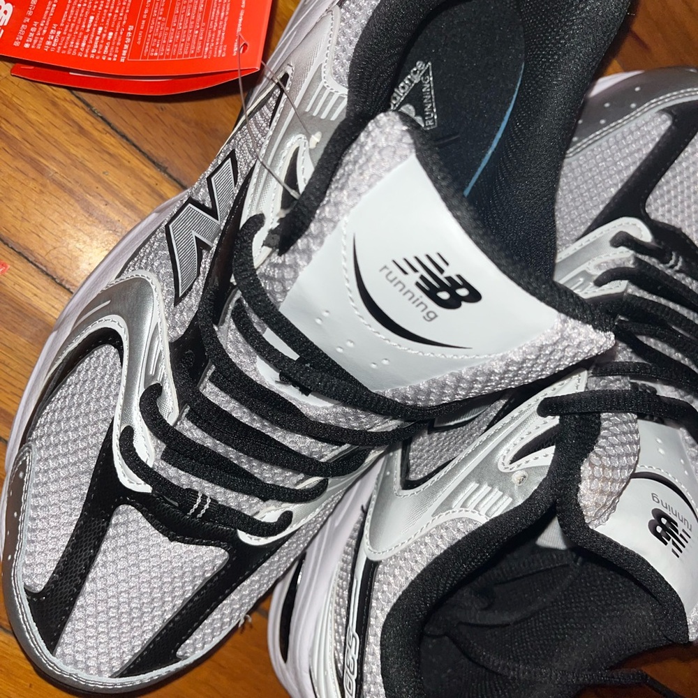 New Balance Black and White Athletic Shoes